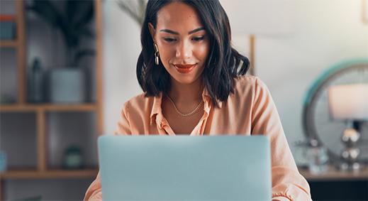 Woman working on her laptop.